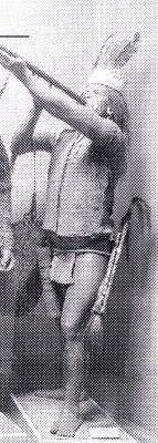 mulaj; Dayak cu podoabe și arme tradiționale